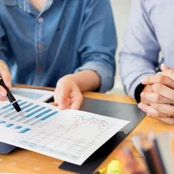 Couple looking at their financial planning reports